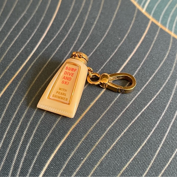 Juicy Couture Jewelry - Juicy Couture Suntan Lotion Charm